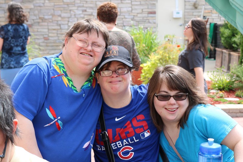 Three female friends with Down syndrome