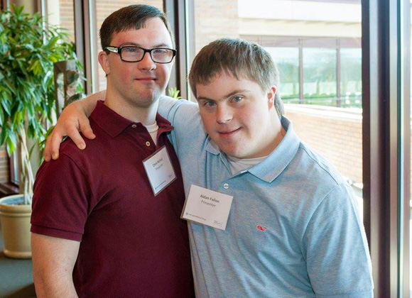 Two young male friends with Down syndrome